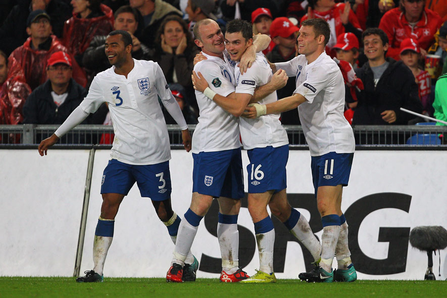 Adam Johnson (third from left) is congratulated after scoring England's second goal against Switzerland.